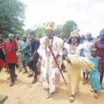 The traditional ruler and wife arriving the venue of the event