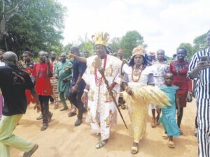 The traditional ruler and wife arriving the venue of the event