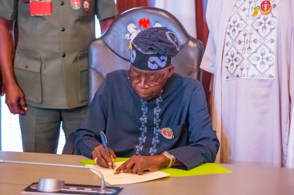 Tinubu signs