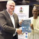 Regional UN-Habitat Office, Senior Human Settlement Officer, Mr Mathias Spaliviero (L), Minister of Housing and Urban Development Architect Ahmed Musa Dangiwa (R)