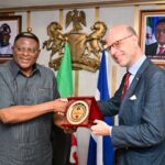 Cross River Governor Bassey Otu (L), Consul General of the Kingdom of the Netherlands, Mr Michel Deelen (R)