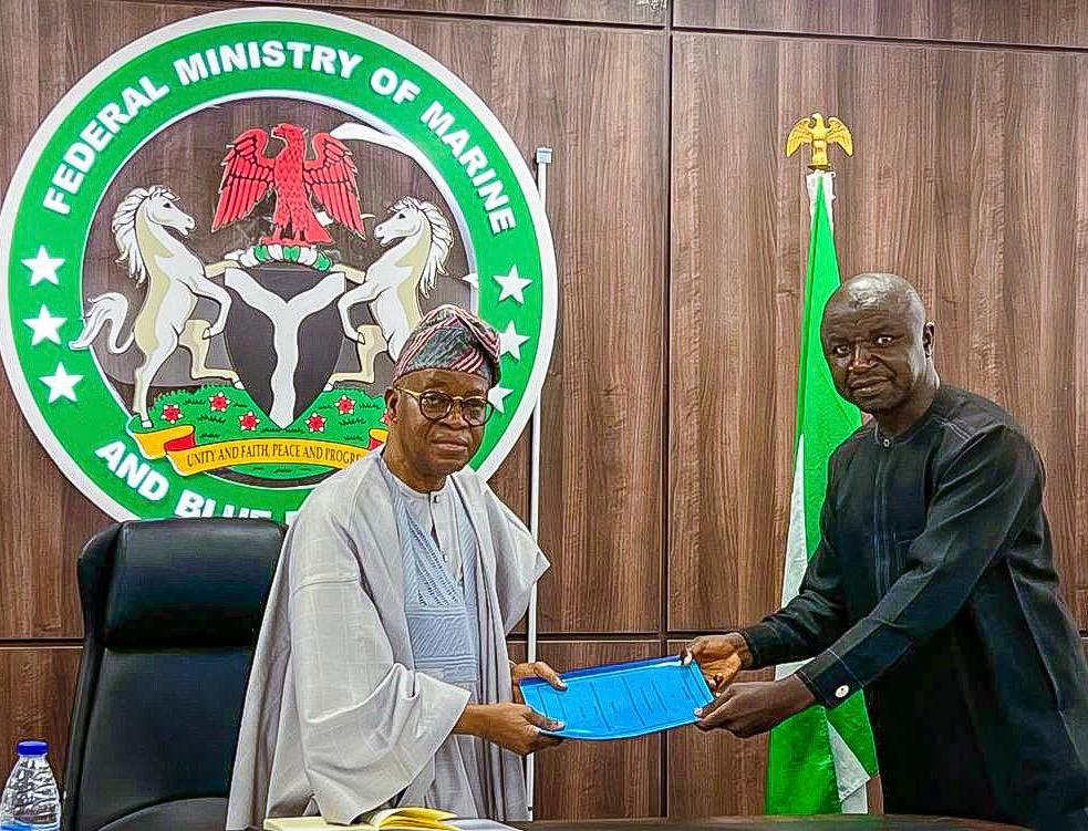 Oyetola with the President National Fishers Cooperative of Nigeria Mr. Mashi Gabriel Sani during the meeting in Abuja