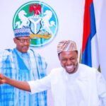 President Muhammadu Buhari and photographer Bayo Omoboriowo