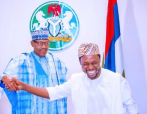 President Muhammadu Buhari and photographer Bayo Omoboriowo
