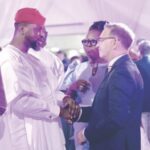 Debola Williams with the Consul General, Laurent Favier, at the French National Say celebrations, in Lagos