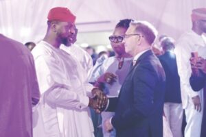 Debola Williams with the Consul General, Laurent Favier, at the French National Say celebrations, in Lagos