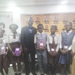 Dr. Olatunbosun and Mrs. Ego pose with winners of the competition