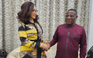 Nigeria’s Minister of State for Foreign Affairs Bianca Odumegwu-Ojukwu shakes hands with Christian Tetteh Yohuno, Ghana’s Inspector General of Police