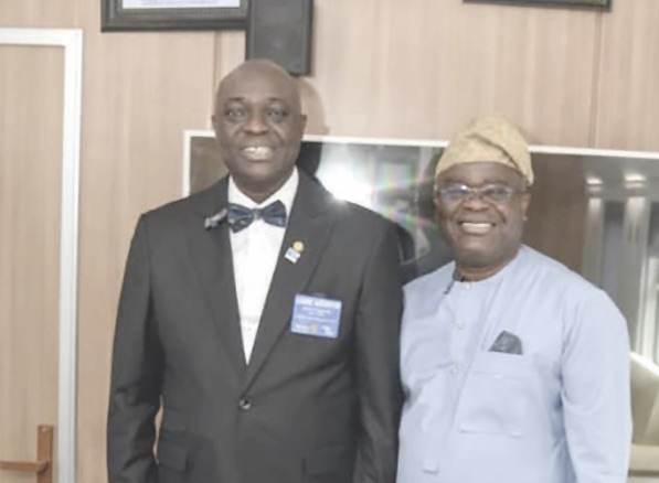 (L-R) District Governor, District 9110 Rotarian Adedoyin Lanre, Managing Director, NRC, Dr. Kayode Opeifa.