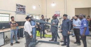 NADDC DG, Oluwemimo Osanipin, and representatives of the Simba Group, inside the NADDC Automotive Training Centre, in Ado-Ekiti, during the three-day training