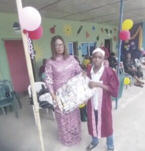 Onyemaizu receiving gift from Nwakobi
