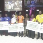 Prof. Lawal-Are (middle) and winners of GST quiz
