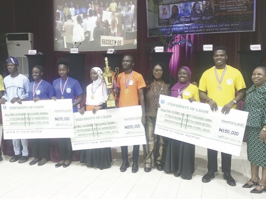 Prof. Lawal-Are (middle) and winners of GST quiz