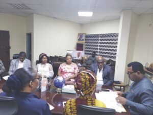 Representatives of both Tilova For Africa and National Human rights Commission during signing of MOU