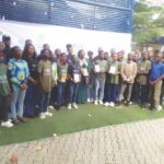 The author (m)with some of the teenagers after the Book launch