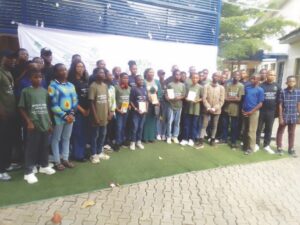 The author (m)with some of the teenagers after the Book launch
