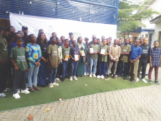 The author (m)with some of the teenagers after the Book launch