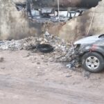 The broken fence of the filling station