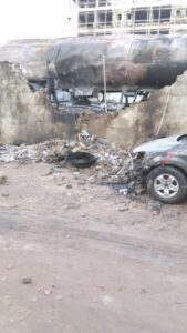 The broken fence of the filling station