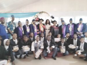 Tokunbo-Famuyibo, Akala, Bamgbose, Anifowose and students displaying awards