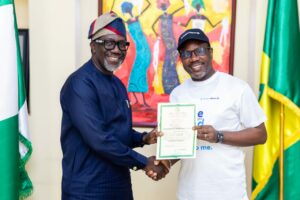 Commissioner for Insurance Mr Ayo Omosehin (left) at the handover ceremony
