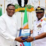 Cross River Governor Bassey Otu (L) hosts Rear Admiral Ayo Olugbode (R)