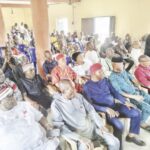 •Ekoli Edda people during a reconciliation meeting.