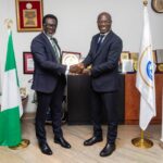 Mr. Omosehin (left) and Mr. Agama