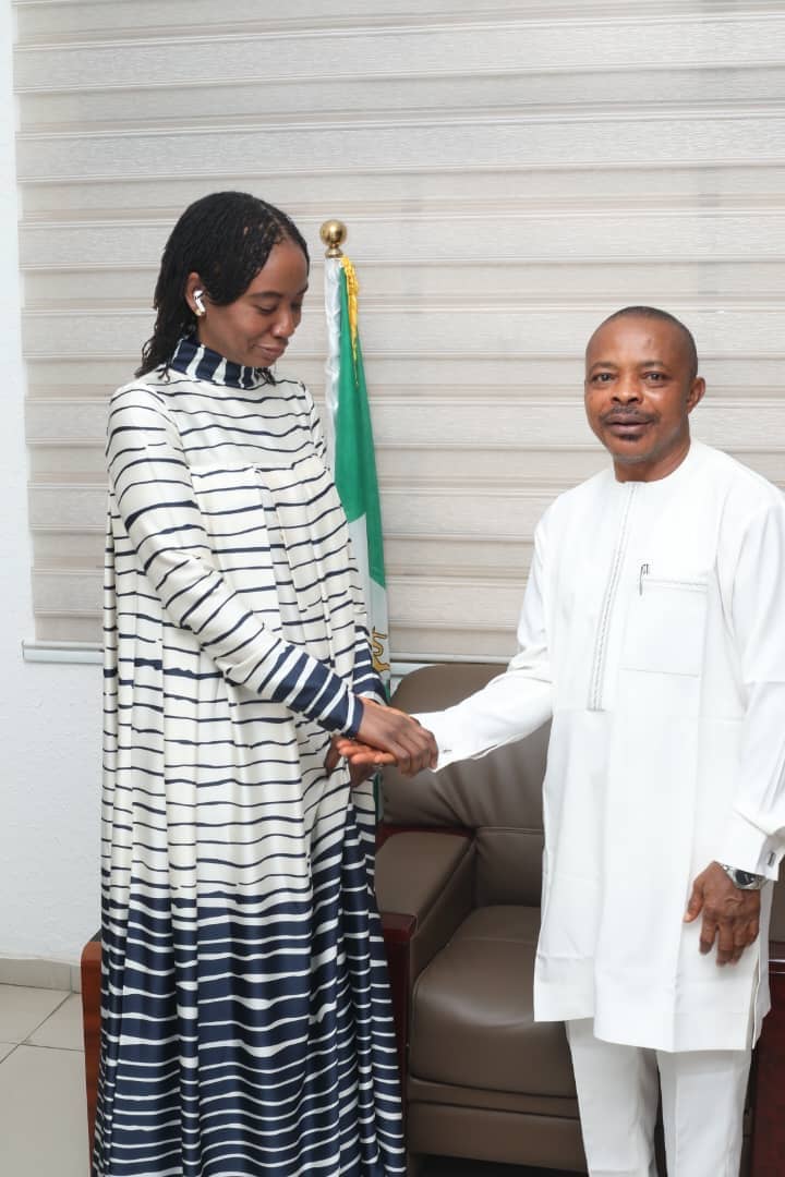 Comrade Joe Ajaero in a handshake with Mrs Omolola Oloraran