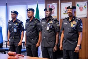 IGP decorates 2023/2024 police officers, meets PenCom
