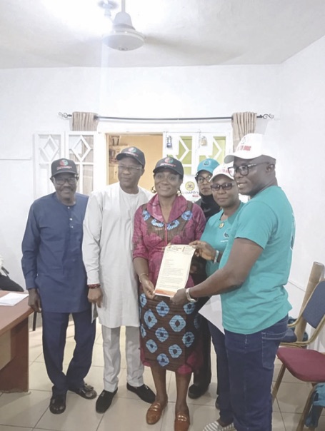 Ibiba Odili, ADF members, others, in a photo session