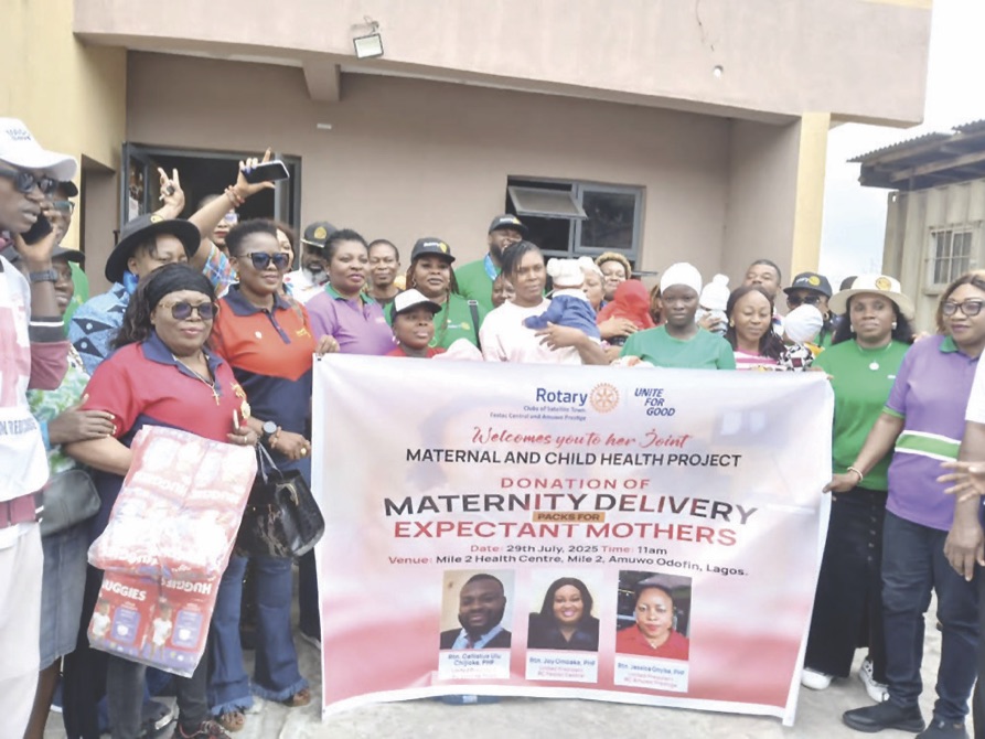 Rotarians and beneficiaries at the event