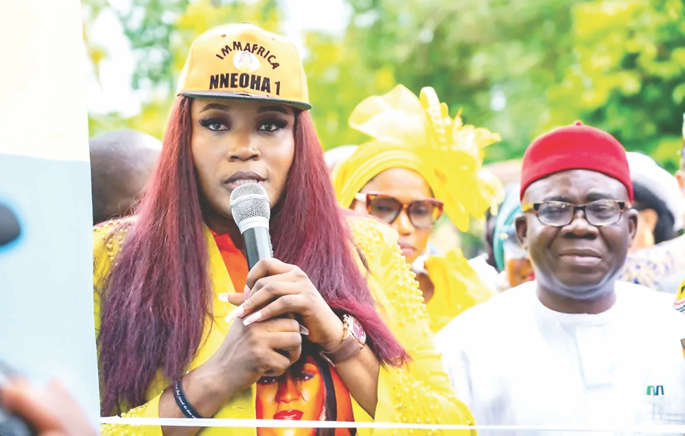 Ibe addressing Mrs. Nwifuru during the event