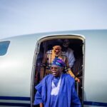 Tinubu on a plane