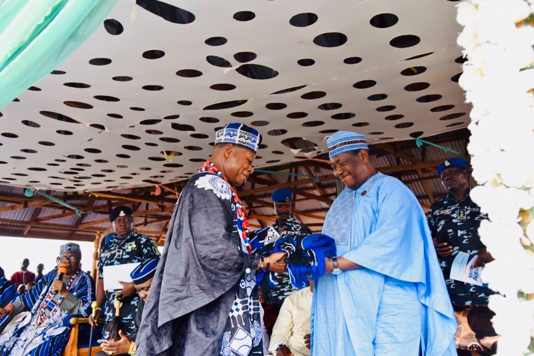The SGF, Sen. George Akume receiving a gift of the Igede traditional cloth at the Igede Agba Festival.