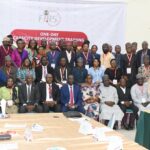 Chairman of the Presidential Committee on Fiscal Policy and Tax Reforms, Taiwo Oyedele, alongside a Federal Inland Revenue Service (FIRS) official and participants at the One-Day Training on the New Tax Laws for State House Correspondents organized by FIRS