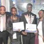 Abodunrin (2nd left), Akiogbe (2nd right) with Mr. Eigbe (left) and wife, Juliana (right), at the graduation