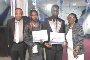 Abodunrin (2nd left), Akiogbe (2nd right) with Mr. Eigbe (left) and wife, Juliana (right), at the graduation