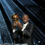Demeble with the Ballon d’Or trophy