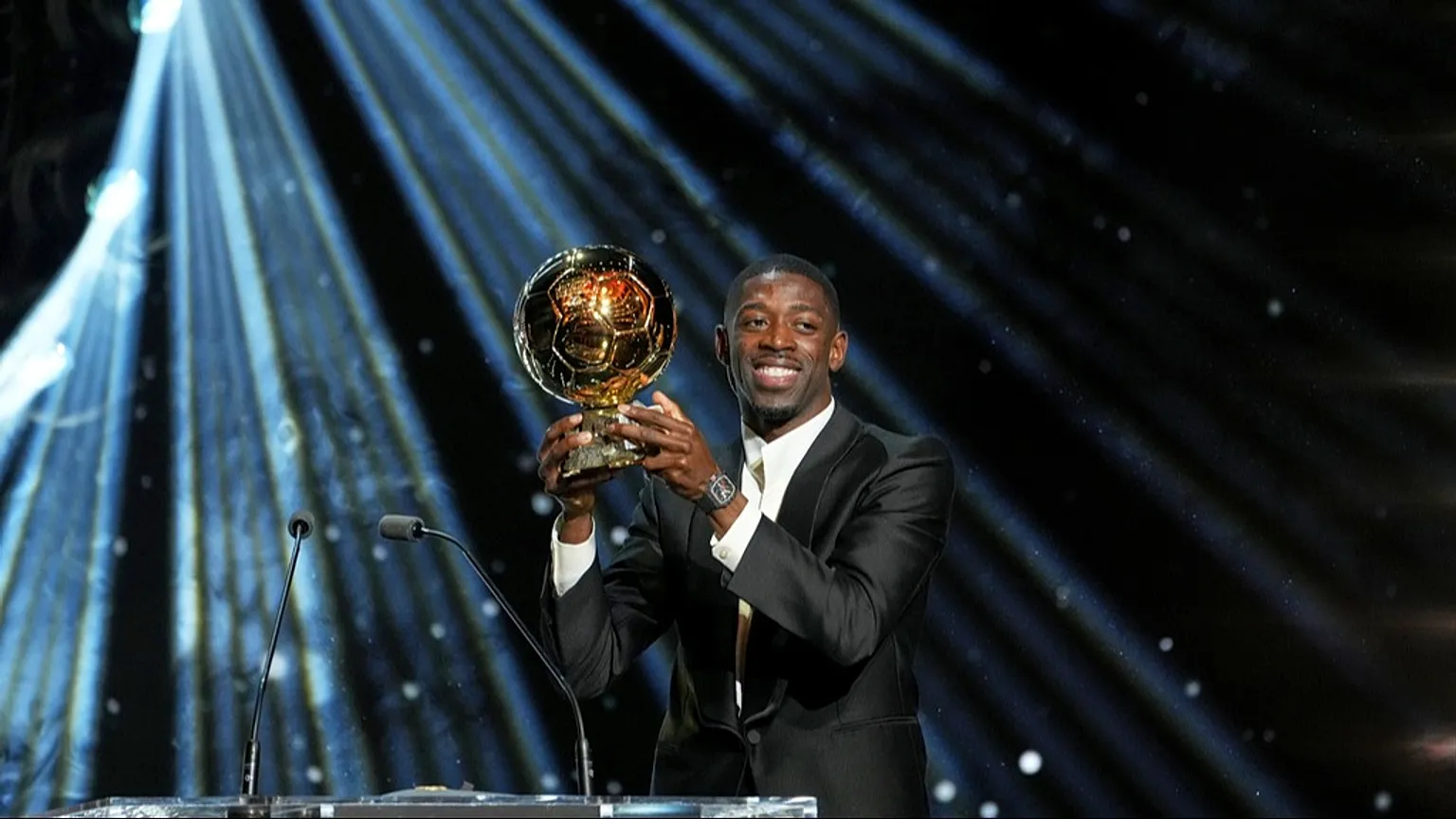 Demeble with the Ballon d’Or trophy