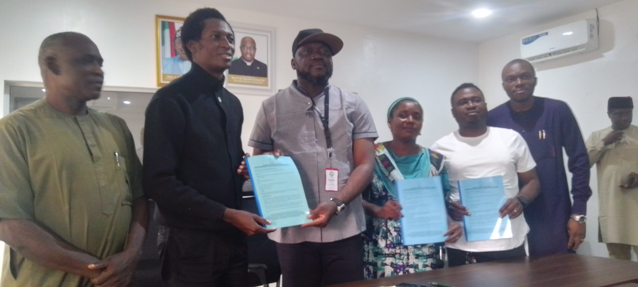 2. DG BICD, Dr. Leo-Angelo Viashima and Executive Director of JDPCI Abuja, Rev. Fr. Sebastian Sanni (in black) at the meeting.
