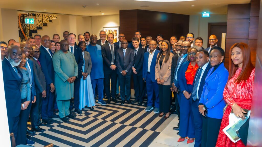 Lokpobiri and participants at the OPTS Roundtable