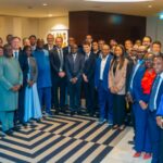 Lokpobiri and participants at the OPTS Roundtable