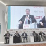 Managing director of Stellantis Sub-Sahara Africa, Mr. Mike Whitfield (on the giant screen), and other discussants at the IATF 2025