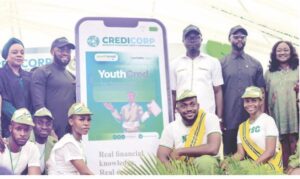 Officials of CREDICORP, Mr. Olawande, Corps members and NYSC Lagos Coordinator, Mrs. Salmwang
