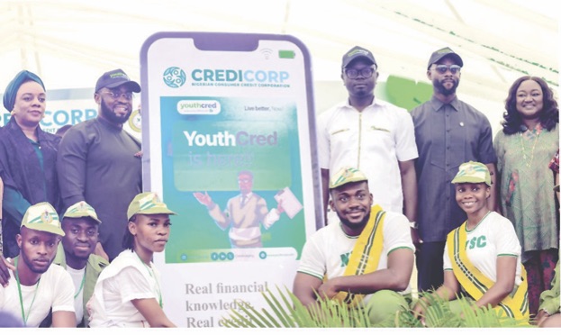 Officials of CREDICORP, Mr. Olawande, Corps members and NYSC Lagos Coordinator, Mrs. Salmwang
