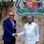 Captain Chris Anusiem (L), Abia Governor Alex Otti (R)