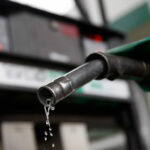 Petrol dripping from pump at forecourt