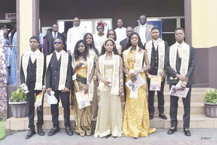 •Graduating students with the Education Director, Mrs. Bolajoko Falore, and some teachers (back row).