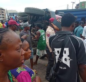 Onitsha: Two crushed to death as container falls on tricycle